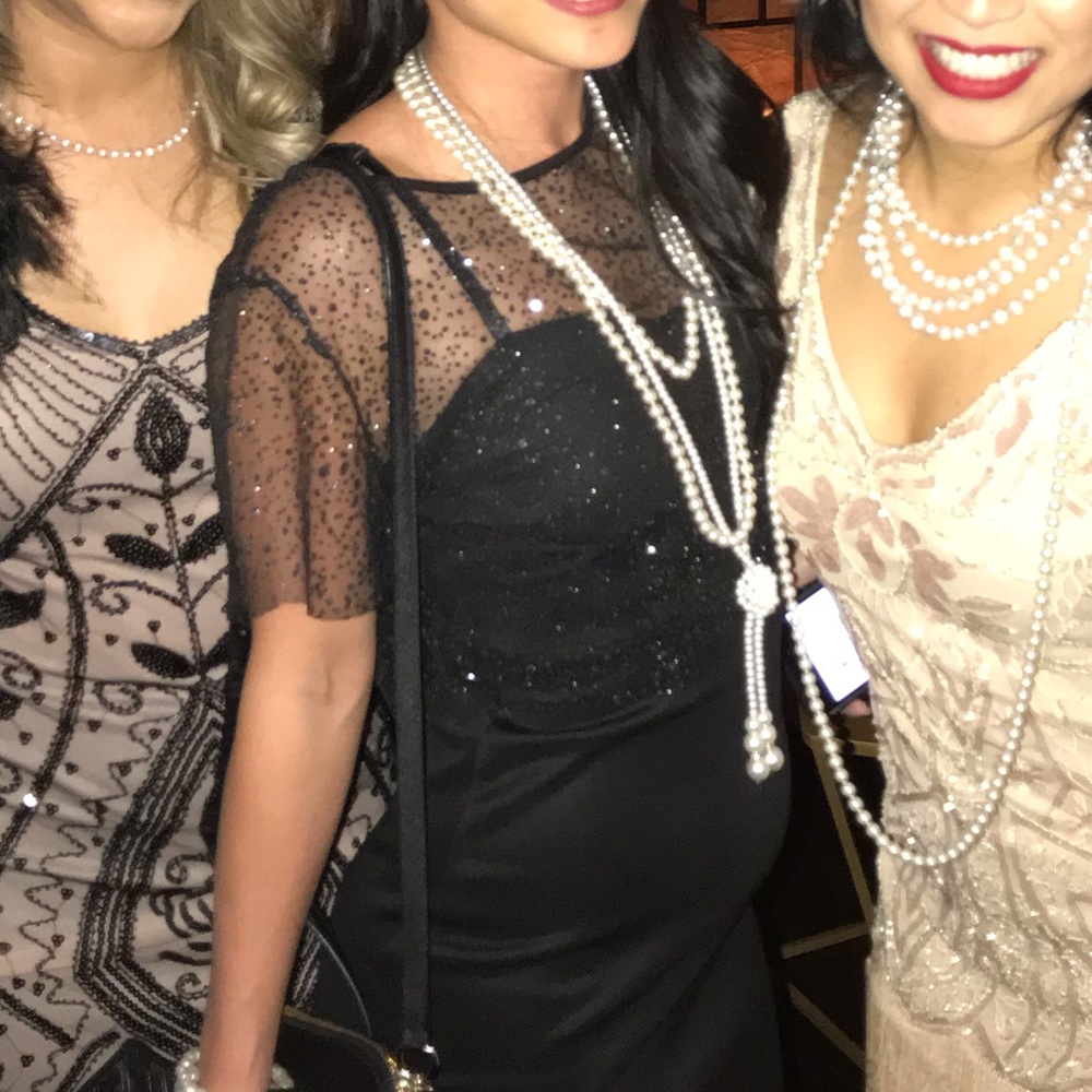 Sheer sparkly black top